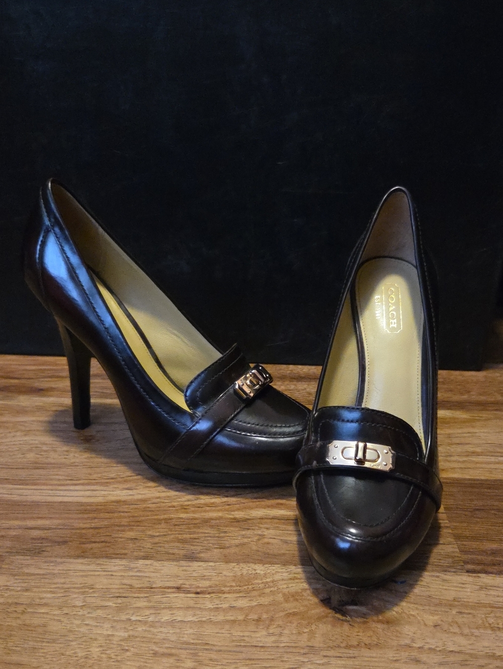 Coach Dark Brown Leather High Heel Loafers with Gold Buckle. Women's Size 7.5